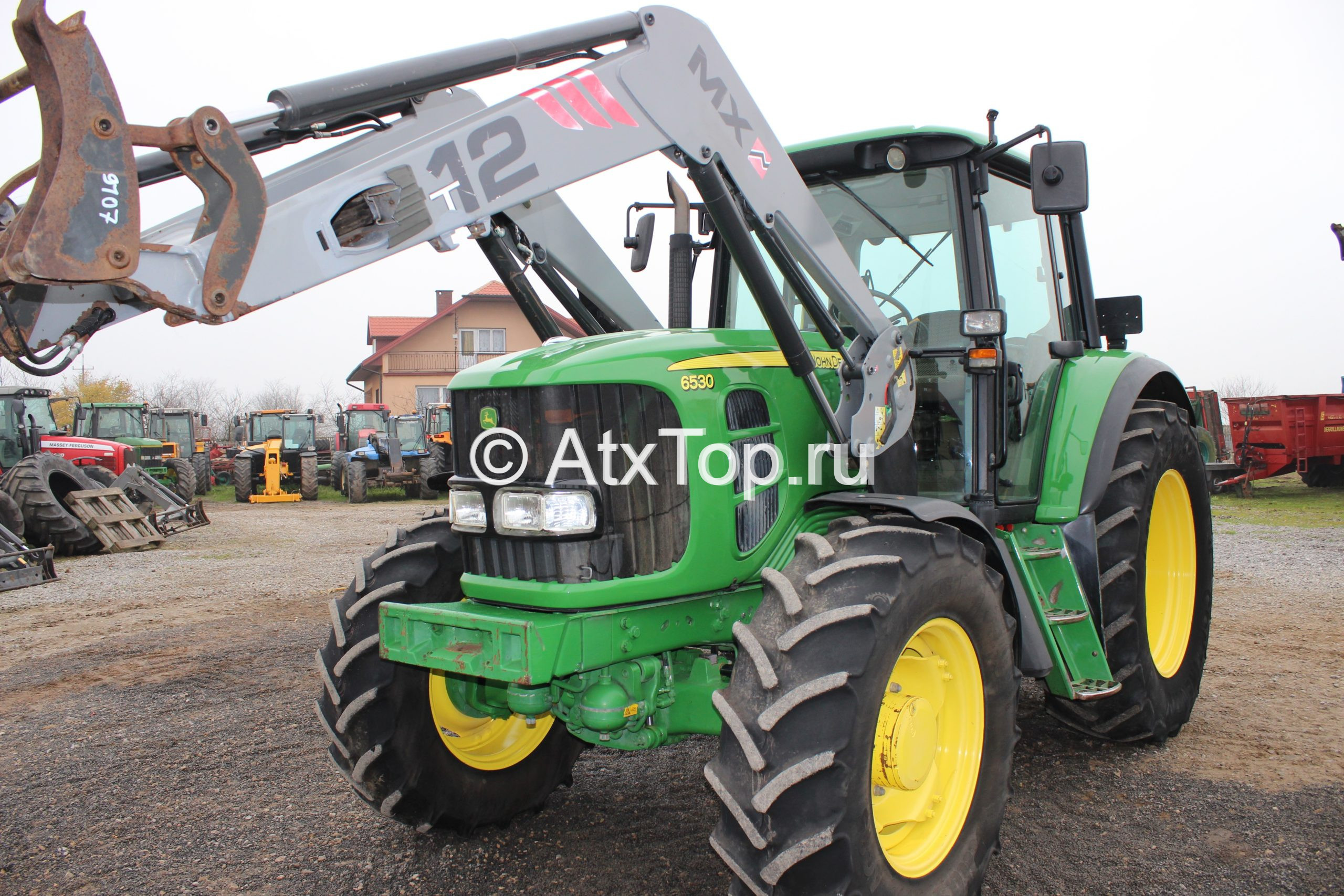 Трактор John Deere 6530